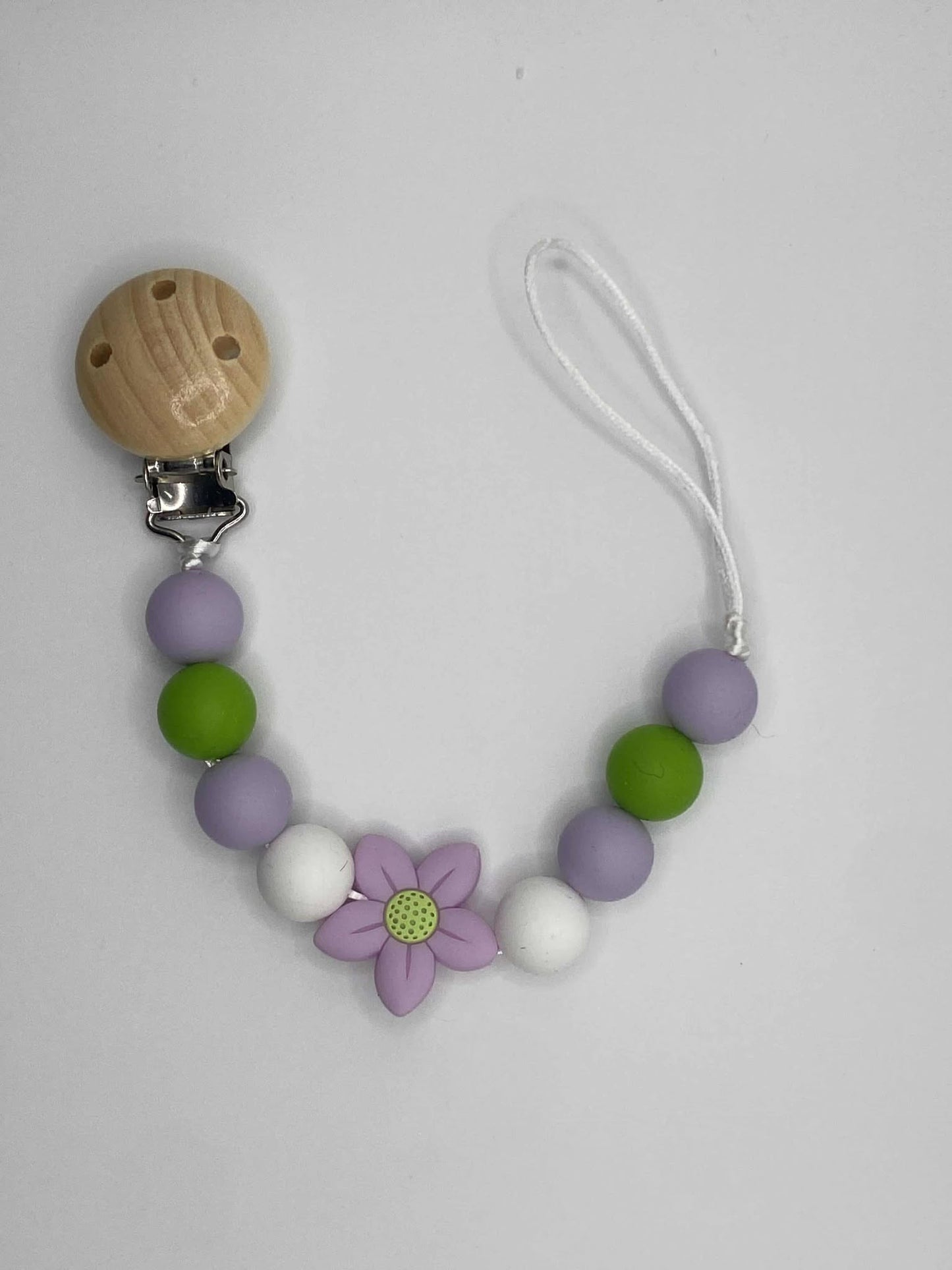 Attache suce fleur